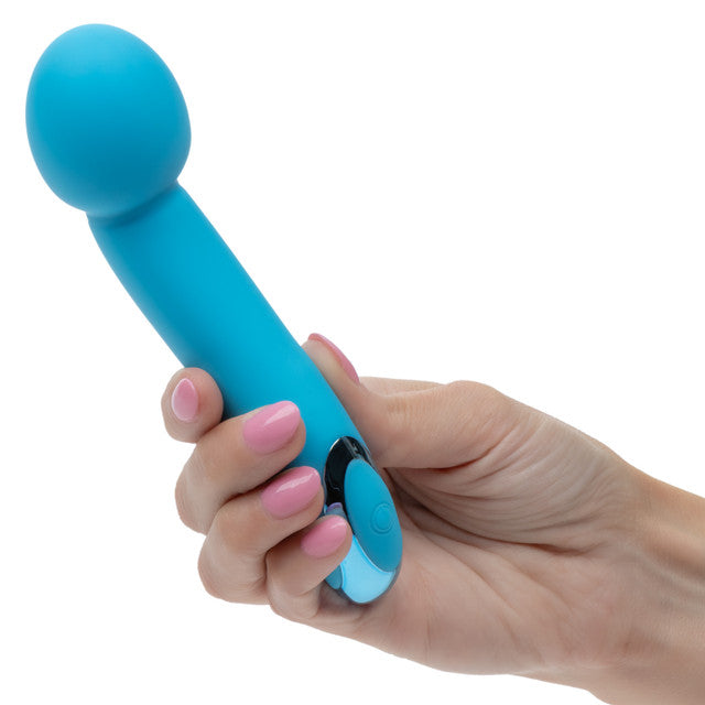 Kroma Turbo G Vibrator Blue held in a hand, showcasing its smooth silicone and ergonomic design for precise stimulation.
