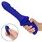 Blue ridged thruster sex machine with remote control in hand, featuring 10 vibration speeds and 5 thrusting levels for pleasure.