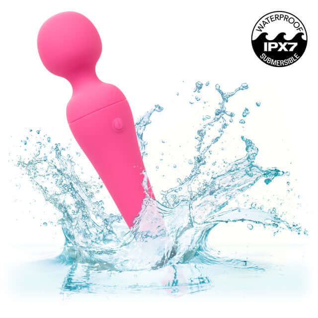 Pink waterproof silicone massager splashing in water, highlighting 10 vibration speeds for versatile pleasure and relaxation.