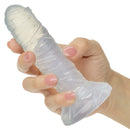 Monster Dong The Invisible Man Silicone Dildo 6 inch Clear held in hand with smooth transparent design.