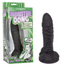 Monster Dong The Gill Man Silicone Dildo 7.25 inch Black in packaging with bold design and detailed texture.