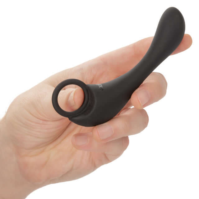 Hand holding Dr. Joel Kaplan Rechargeable Prostate Locator with retrieval ring and ergonomic design for prostate stimulation.