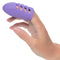 Dr. Laura Berman Rechargeable Finger Vibe on hand, showcasing compact and discreet design with dual-finger sleeve for powerful vibrations.