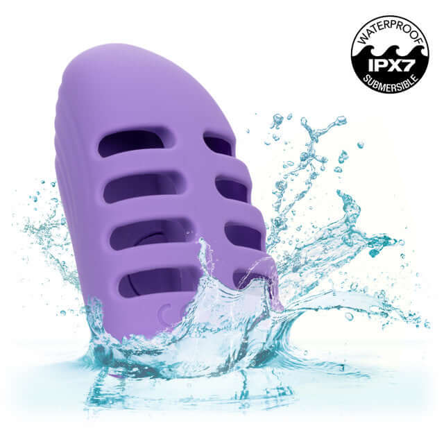 Dr. Laura Berman Rechargeable Finger Vibe in water, showcasing its IPX7 waterproof feature and sleek purple design.