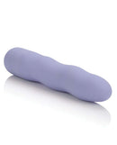 First Time Mini Power Swirl Vibrator Purple showcasing its curvaceous, velvety-soft design for beginners.