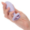 First Time Crystal Booty Duo silicone anal plug in hand, featuring heart crystal inlay, purple color, perfect for backdoor play.