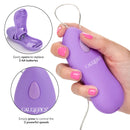 Whisper Micro Heated Purple Vibrator with 2 AA battery compartment and control button for 2 powerful speeds.