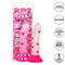 Glow Stick Heart Dildo in packaging with glow-in-the-dark heart pattern and suction cup base, made from soft silicone, fits most harnesses.