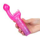 Butterfly Kiss Pink Vibrator held in a hand, showcasing its curved design and vibrant pink color.