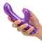 Hand holding G-Kiss Purple Vibrator with dual motors for G-Spot and clitoral arousal