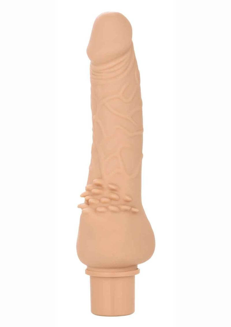 Rechargeable Power Stud Cliterrific silicone vibrating dildo in vanilla color, featuring realistic design and 12 vibration functions.