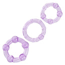 Trio of purple stretchy cock rings in small, medium, and large sizes from Island Rings by California Exotic Novelties.