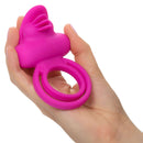 Rechargeable Dual Clit Flicker Enhancer Pink held in a hand, showcasing its ergonomic design and vibrant color.