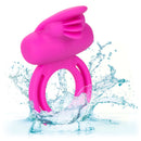 Rechargeable Dual Clit Flicker Enhancer Pink depicted splashing in water, showcasing its vibrant design and functionality.