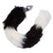 Black and white fur tail butt plug with seamless metallic probe for exciting intimate play.