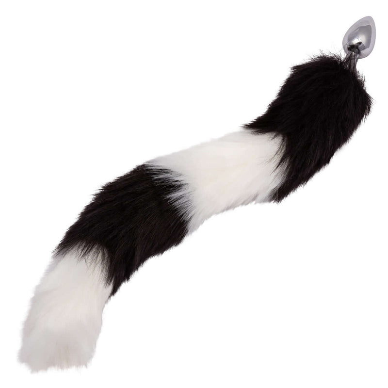 Black and white fur tail butt plug with metallic probe for enhanced pleasure and adventurous intimate play.