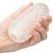 Boundless Reversible Squishy Ball Stroker in hand, showcasing its soft and stretchy design for enhanced pleasure.