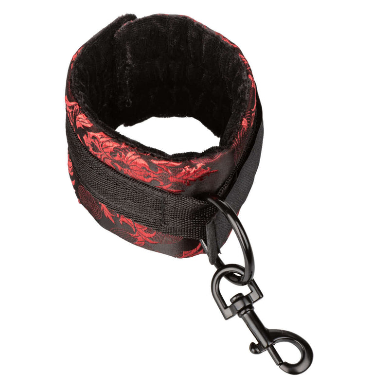 Adjustable red and black scandal hogtie restraint from California Exotic Novelties