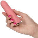 Uncorked Rose Silicone Mini Vibrator Pink held in hand with pink nails, showcasing its sleek design and vibrant color.