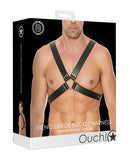 Shots Ouch Men's Large Buckle Harness Black packaging on display featuring a male model wearing the harness.