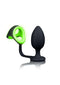 Ouch! Glow Butt Plug with Cock Ring and Ball Strap in black and green, designed for bondage and glow-in-the-dark play.