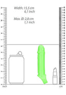 Size comparison of Ouch! Glow in the Dark Smooth Stretchy Penis Sleeve in fluorescent green next to a soda can and lipstick.