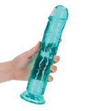 RealRock Crystal Clear 10 Inch Straight Dildo Turquoise held in hand, featuring a smooth translucent design.