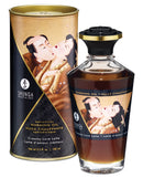 Shunga Warming Oil 3.5 oz Creamy Love Latte bottle with artistic packaging and rich colors.