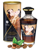Shunga Warming Oil 3.5 oz Creamy Love Latte bottle and packaging with coffee beans.