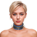 Strict Leather Deluxe Locking Collar Blue and Black on model, showcasing its stylish design and comfort.