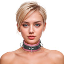 Strict Leather Deluxe Locking Collar Pink and Black model showcasing the bold, flexible leather design.