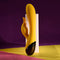 Yellow rechargeable silicone rabbit vibrator with dual motors, featuring a sleek design and bunny stimulator.