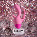 Selopa Game On Triple Stimulation Vibrator Pink showcased against a sparkling background with decorative glass orbs.