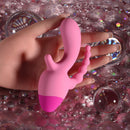 Selopa Game On Triple Stimulation Vibrator Pink in a hand, showcasing its innovative design and pink color.