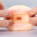 Hands demonstrating the interior of the Savage Sugar Babes Vagina Stroker Kendall with realistic texture.