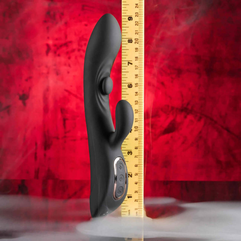 Playboy That's The Spot Dual G-Spot Vibrator with Tapping Feature, 10 Speeds, black color, displayed vertically with ruler for scale.