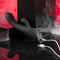 Playboy That's The Spot dual G-Spot vibrator with tapping feature and 10 speeds, charging via USB cable on sleek surface.