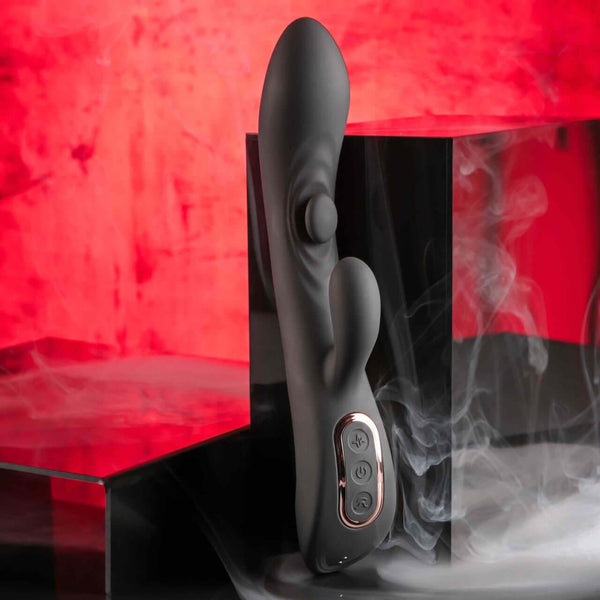 Playboy That's The Spot - Dual G-Spot Vibrator with 10 Speeds and Tapping Feature in smoky red background