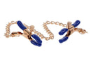 Adjustable Cougar chained nipple clamps with gold chain and blue tips, enhancing BDSM play with elegance and control.