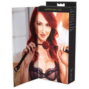 Sportsheets Saffron Ball Gag packaging featuring a woman holding the gag, showcasing its design and purpose.