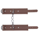 Sportsheets Signature Dawn Dream Handcuffs in stylish brown silicone with silver clips for comfort and restraint play.