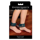 Sportsheets Signature Twilight Tease Ankle Cuffs displayed on a model's ankles with sleek silver hardware.