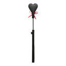 Black and red Sex & Mischief Heart Beat Crop, a playful and elegant spanking tool with a heart-shaped tip.