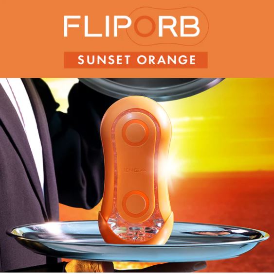 Tenga Flip Orb Sunset Orange Stroker displayed on a silver platter against a sunset background.