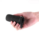 Hand holding the Renegade Supreme Silicone Penis Sleeve Black, showcasing its ergonomic design and premium silicone material.