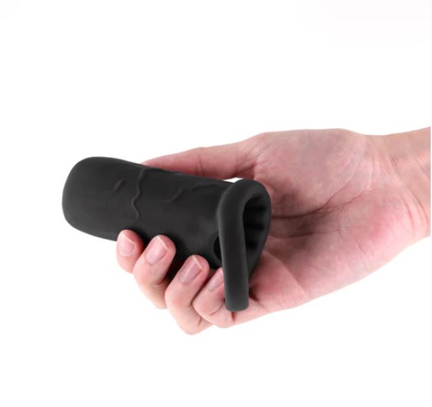 Hand holding the Renegade Supreme Silicone Penis Sleeve Black, showcasing its ergonomic design and premium silicone material.