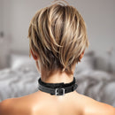 Strict Leather Narrow Fur Lined Locking Collar showcased on a model's neck with a stylish short haircut.