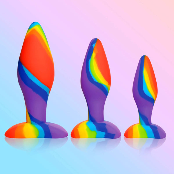 Simply Sweet Rainbow Silicone Butt Plug Set in three sizes with vibrant colors. Premium grade, hypoallergenic and non-porous silicone.