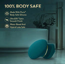 Blush Riana Silicone Clitoral Stimulator Dark Teal with body-safe silicone and smooth finish in a bathroom setting.