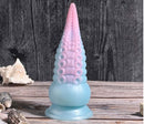 Selopa Stuck on You rechargeable silicone dildo in pink and blue, featuring flexible tentacle design and suction cup base.